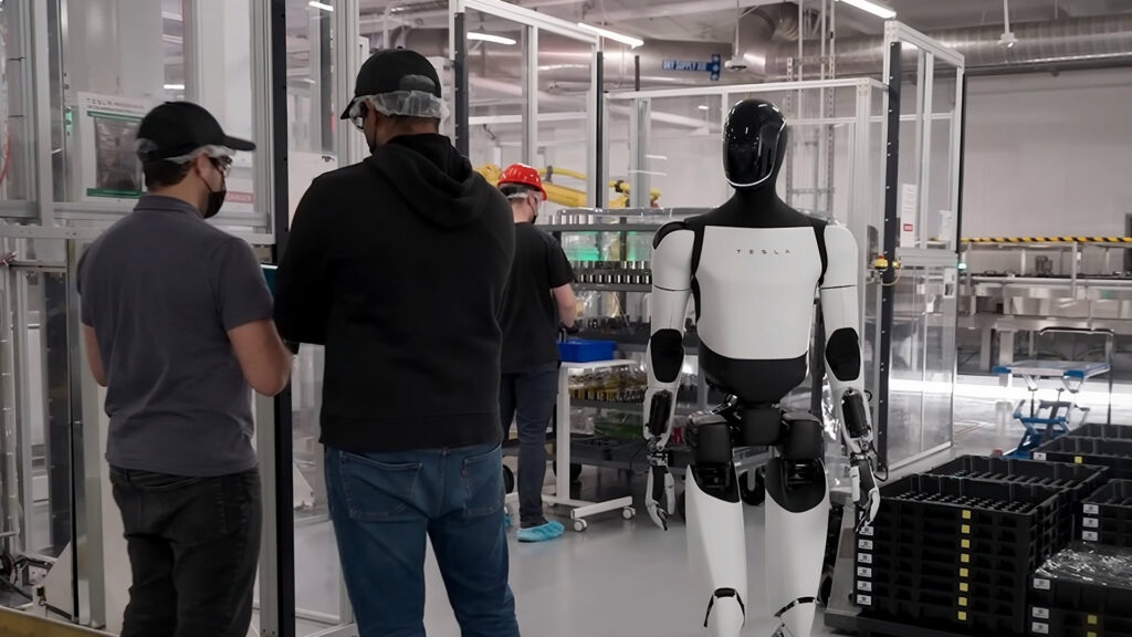 Tesla, Tesla Optimus, humanoid robot, robot training, Gigafactory Grünheide, Tesla Optimus robot training in Germany, Tesla Optimus Training, Tesla employees train Optimus humanoid robot, Optimus, Roboter